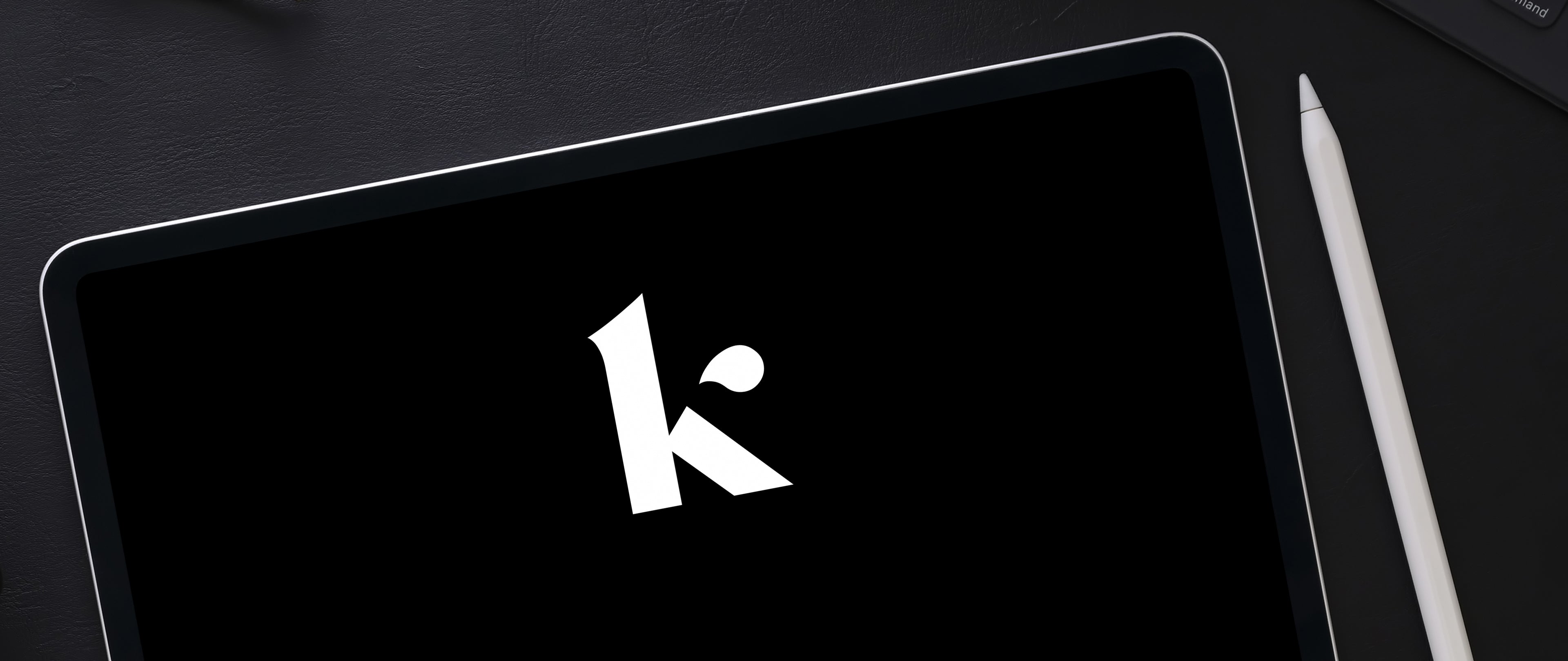 k logo on tablet aerial view